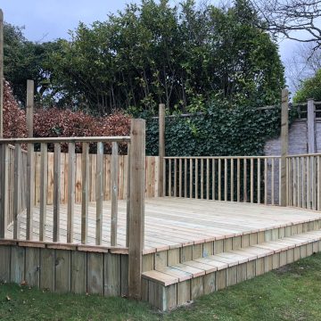 Decking area in garden with steps