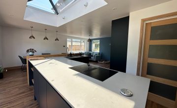 Contemporary Kitchen with Large Island & Family Area