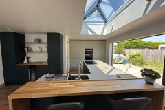 Large double exension with new fitted kitchen with large roof lantern and bi-fold doors