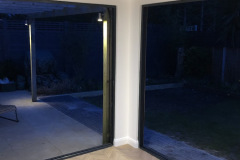 Outside room interior at night lit up